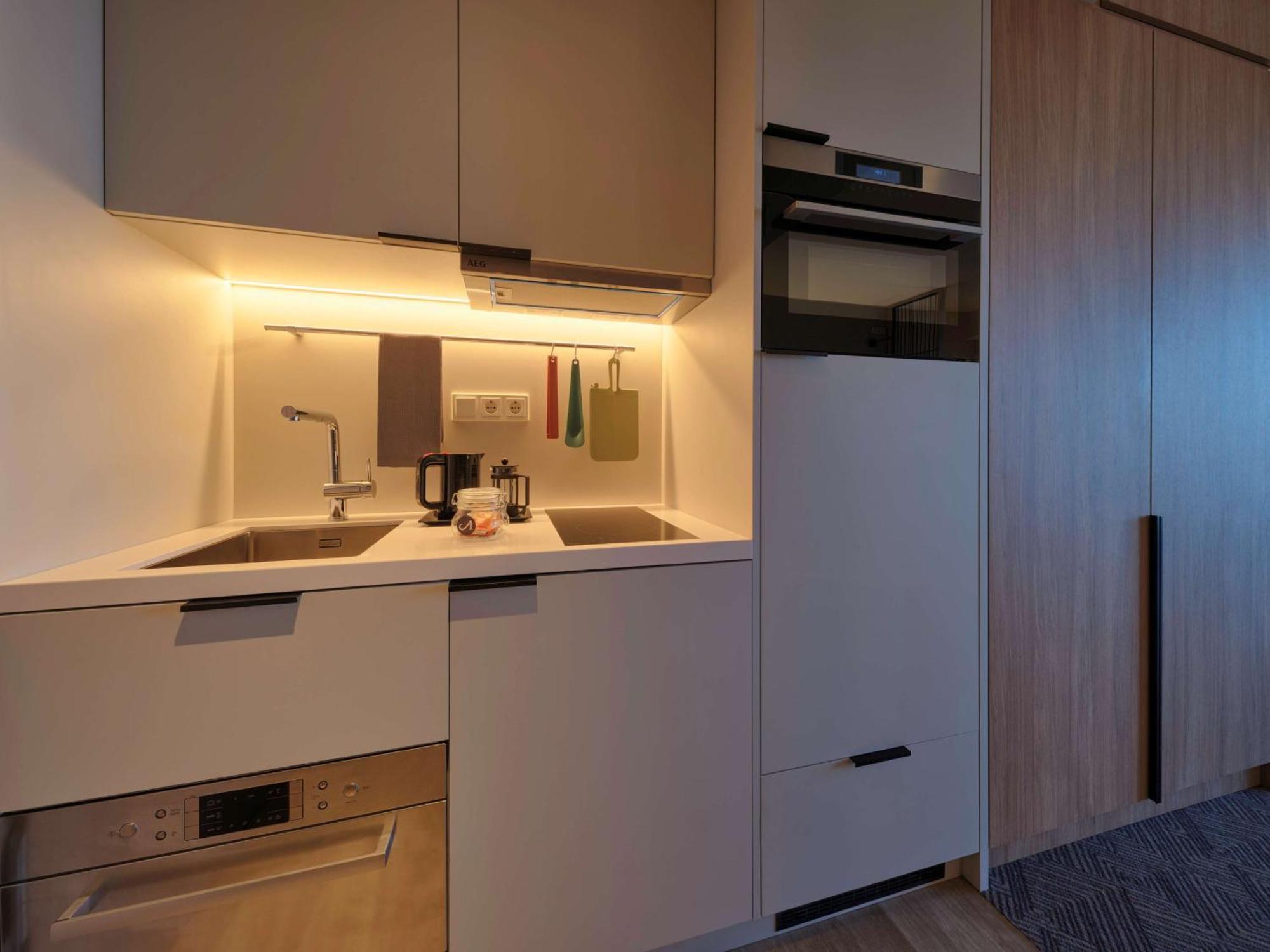 Adina Apartment Hotel Мюнхен Экстерьер фото