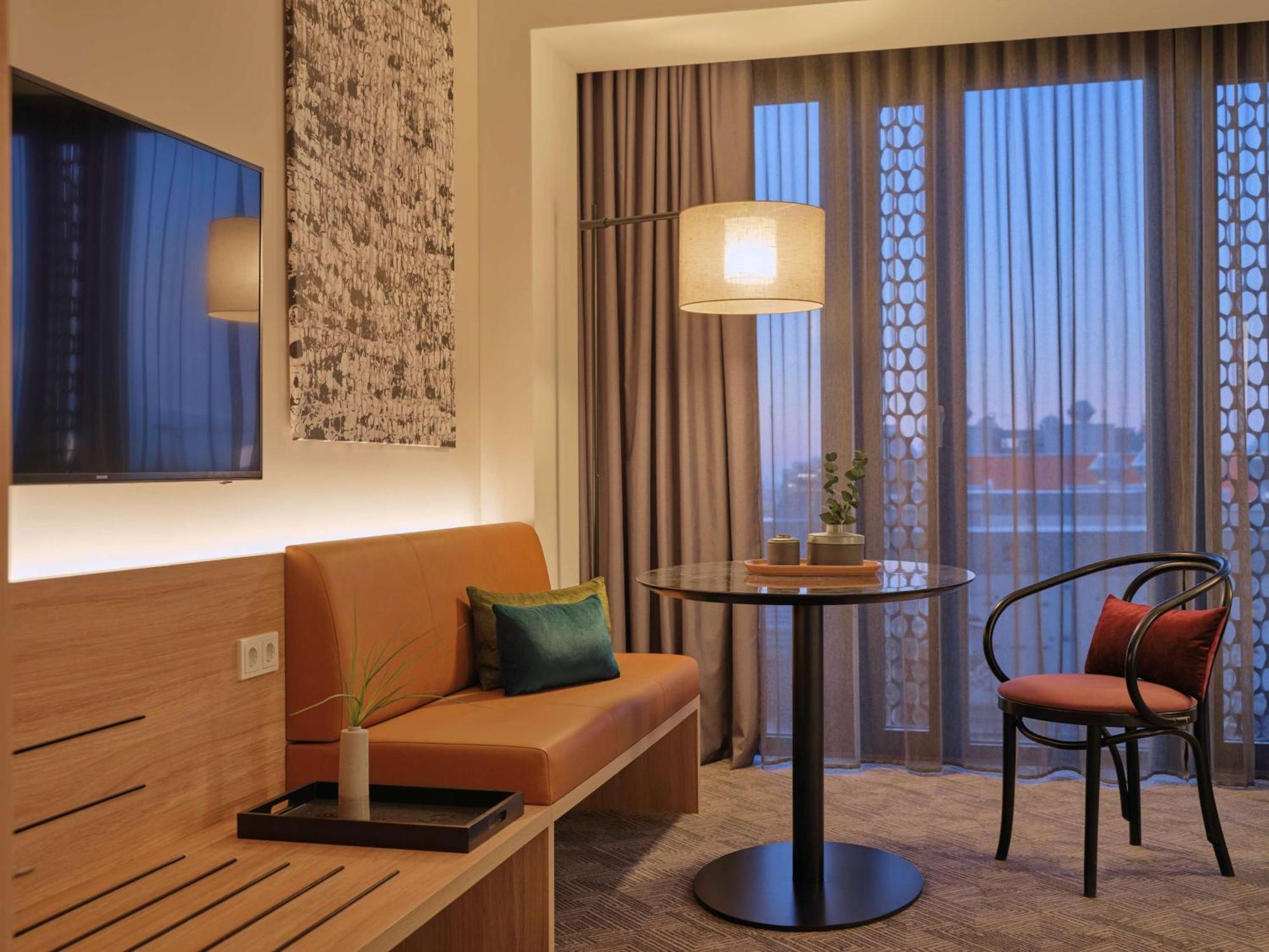 Adina Apartment Hotel Мюнхен Экстерьер фото