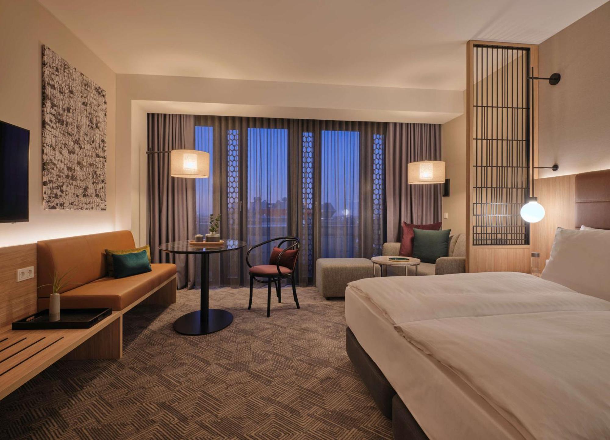 Adina Apartment Hotel Мюнхен Экстерьер фото